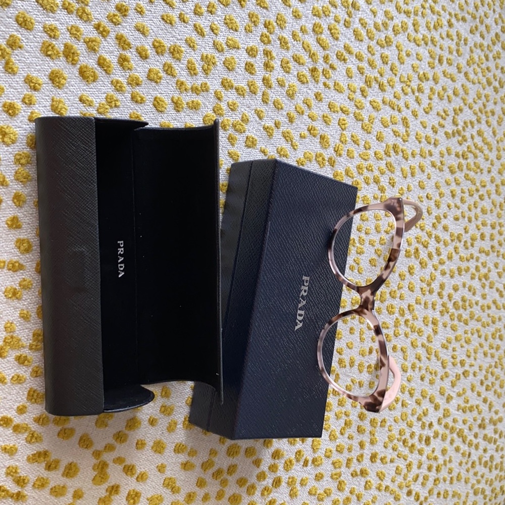 Prada light pink tortoiseshell glasses
